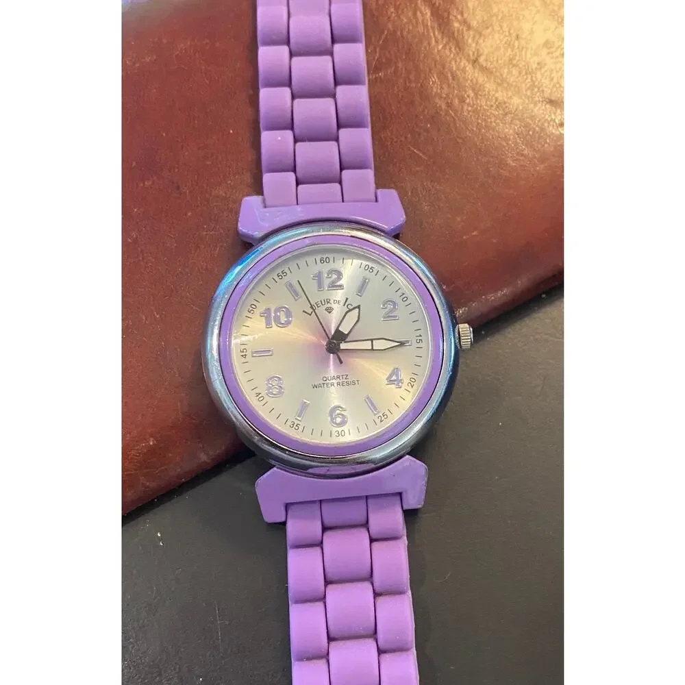Women's Silver Tone Lueur De Ice Watch, Purple Poly Band and Bezel